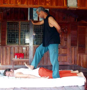 Bhagavan Shanmukha giving an Ayurvedic Massage